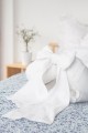 linen baby nest with bow