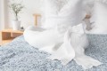 linen baby nest with bow
