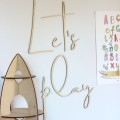 Wooden inscription on the wall for a child's room
